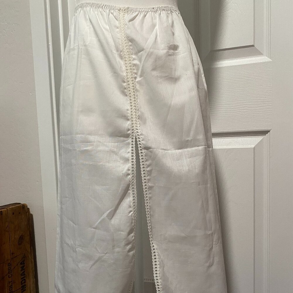 Vintage, Cotton Slip. Brand is Movie star. Small.